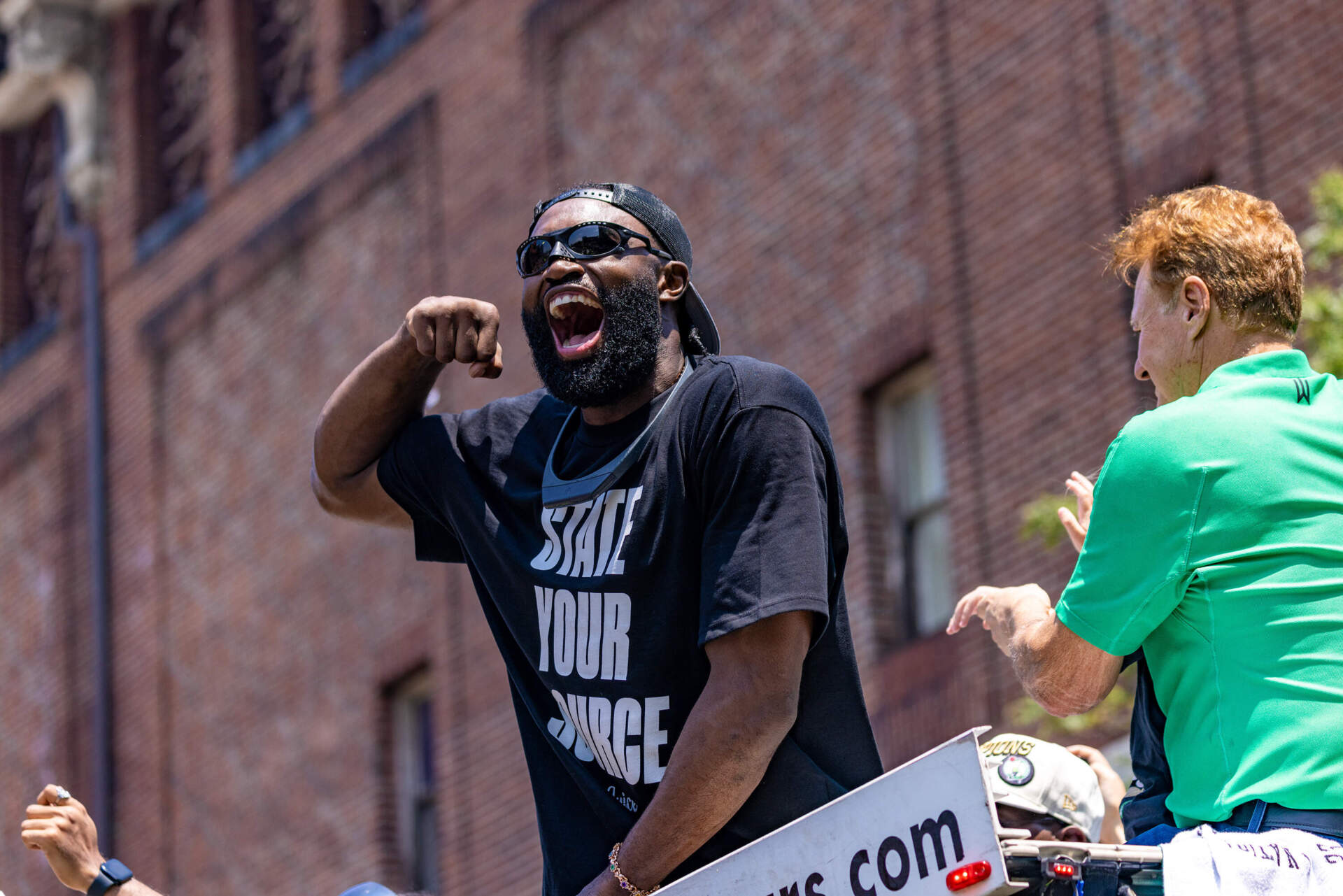 Jaylen Brown screams to the crowd during the Celtics championship celebration. (Jesse Costa/WBUR)