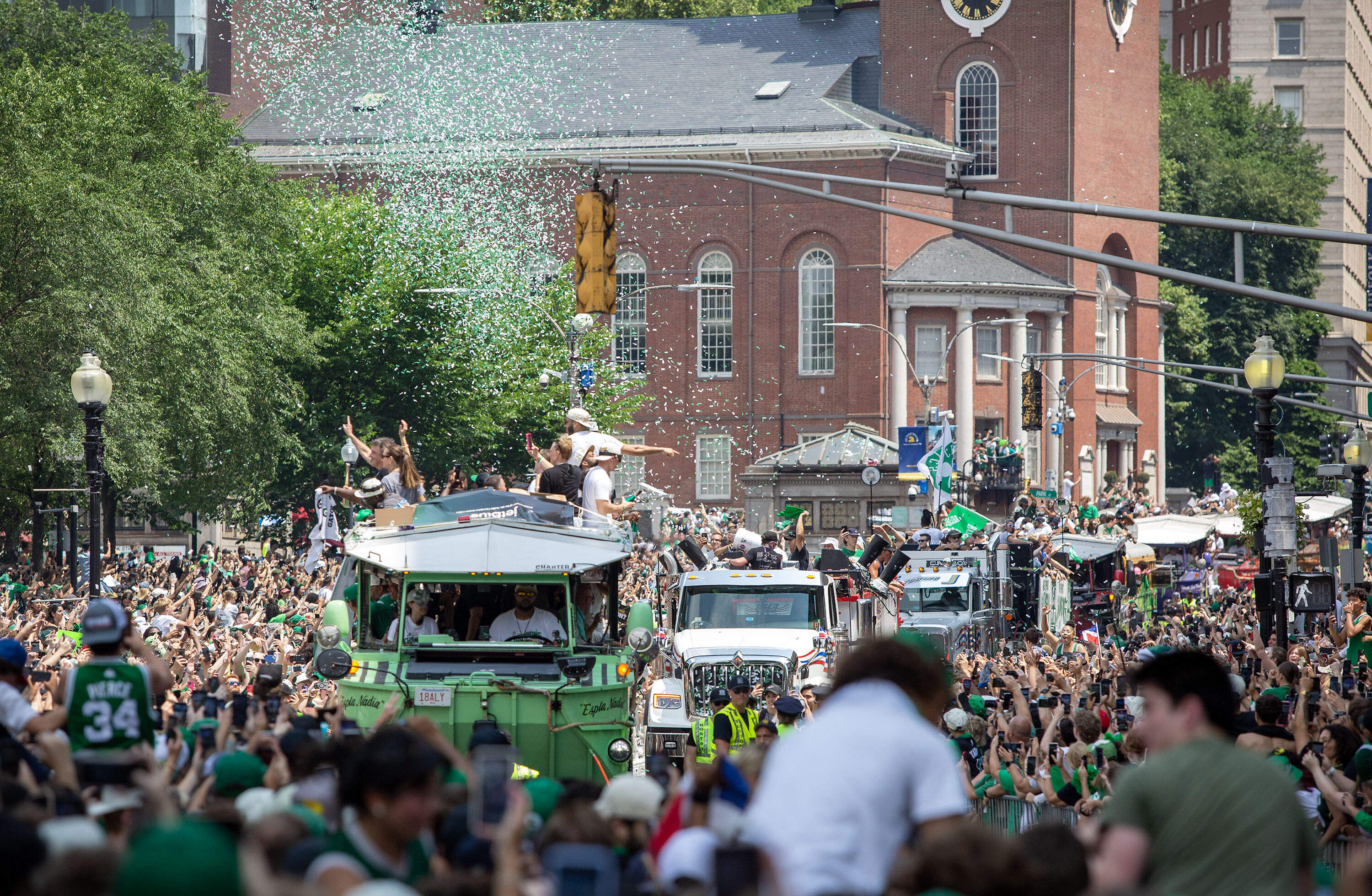 Celtics fans fill Tremont Street as the team's Duck Boat parade makes its way through Boston. (Robin Lubbock/WBUR)