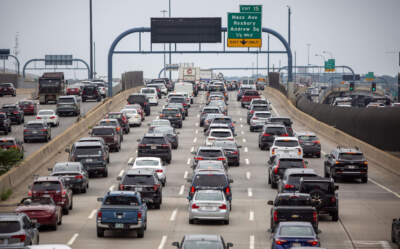 Cars crawl along I-93 South out of Boston, in mid-afternoon traffic congestion. (Robin Lubbock/WBUR)