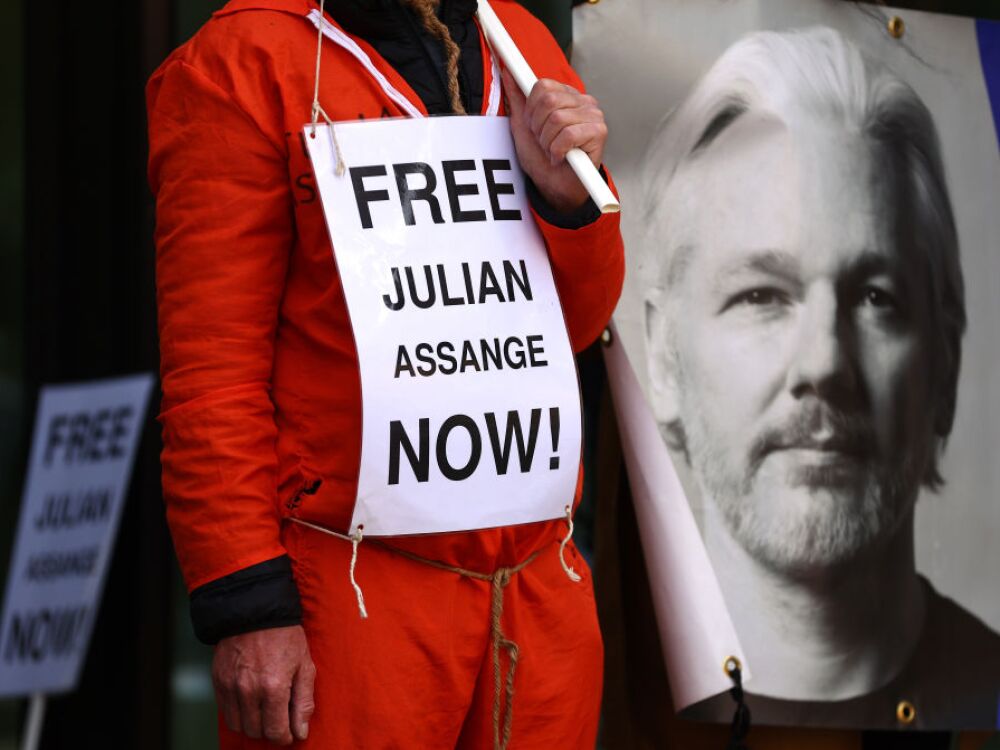 A supporter of Julian Assange protests in front of Westminster Magistrates Court in London, while calling for his release from Belmarsh Prison, on April 14. (Getty Images)