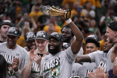 Boston Celtics guard Jaylen Brown, center, celebrates with his teammates after Game 4 of the NBA Eastern Conference basketball finals against the Indiana Pacers, May 27, 2024, in Indianapolis. (Michael Conroy/AP)