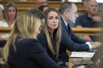 Karen Read, center, sits in court with her legal team during her trial at Norfolk County Superior Court on June 20, 2024, in Dedham, Massachusetts. (David McGlynn/The Patriot Ledger via AP, Pool)