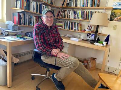 Bill McKibbon, in his office at Middlebury College. The climate change activist has founded Third Act, an effort to recruit Americans over 60 to save the climate and democracy. (Anthony Brooks/WBUR)