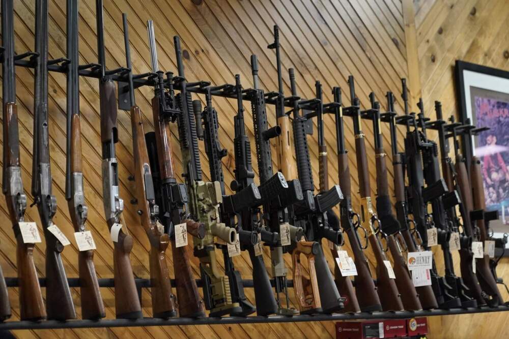 Various guns are displayed at a store in Auburn, Maine, on July 18, 2022. (Robert F. Bukaty/AP)