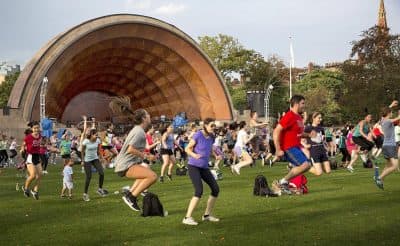 A free Zumba class in front of the Hatch Shell on Boston's Esplanade. (Robin Lubbock/WBUR)