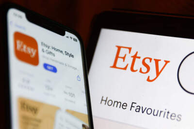 Etsy on App Store displayed on a phone screen and Etsy website displayed on a laptop screen are seen in this illustration photo taken in Krakow, Poland on August 3, 2023. (Jakub Porzycki/NurPhoto via Getty Images)