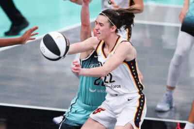 Caitlin Clark #22 of the Indiana Fever passes for the ball against the New York Liberty during the game on June 2, 2024 at the Barclays Center in Brooklyn, New York.  (Rich Graessle/Icon Sportswire via Getty Images)