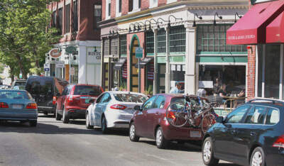 Cars parked at meters on Washington Street in downtown Salem, Mass. (Wendy Maeda/The Boston Globe via Getty Images)