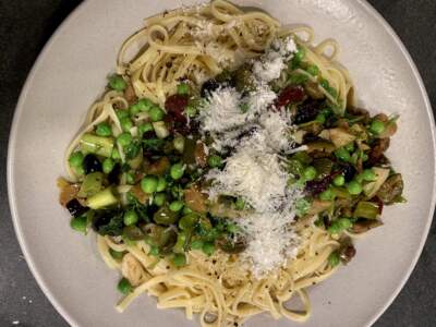 Linguine with mixed olives, spring peas and parsley. (Kathy Gunst/Here & Now)