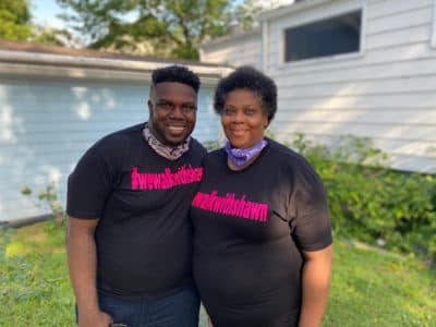 Shawn Dromgoole, 29, next to his mother Lynetra Dunn during an organized neighborhood walk. (Courtesy Shawn Dromgoole)