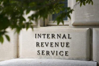 A sign outside the Internal Revenue Service building is seen, May 4, 2021, in Washington. The government is making permanent its new free electronic tax return filing system and expanding to taxpayers in all 50 states. (Patrick Semansky/AP)