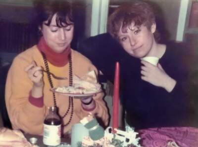 The author (right) and her friend, Barbara, at a newsroom Christmas party, in 1985. (Courtesy Lisa Borders)