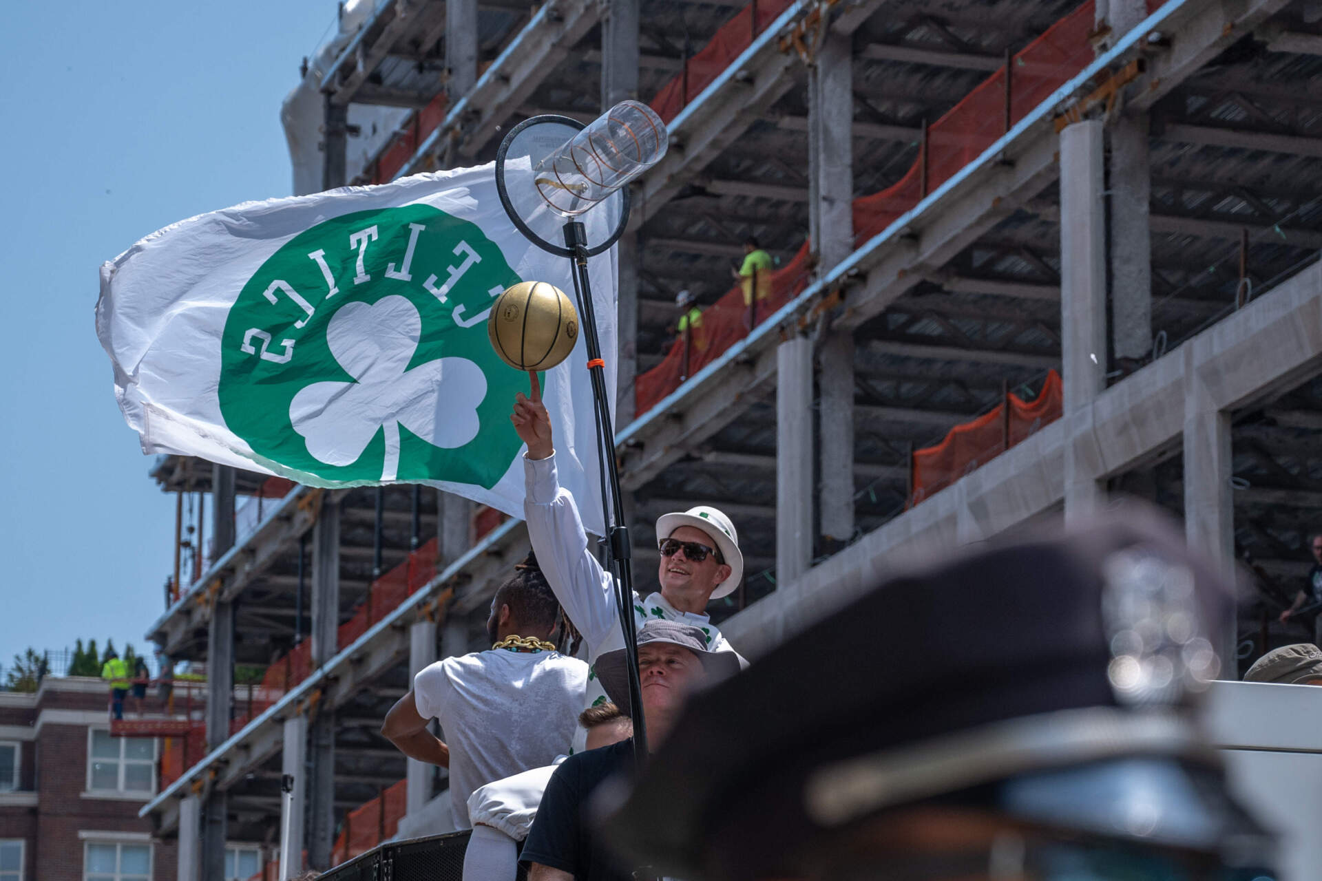 Lucky celebrates on Boylston Street. (Sharon Brody/WBUR)